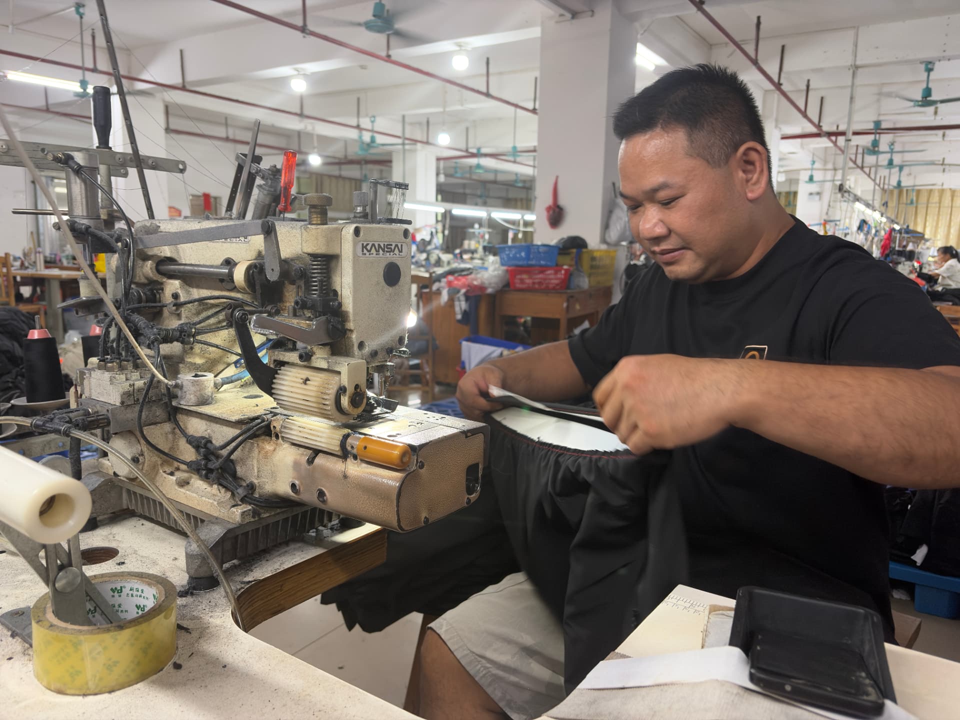 Production team assembling custom sportswear